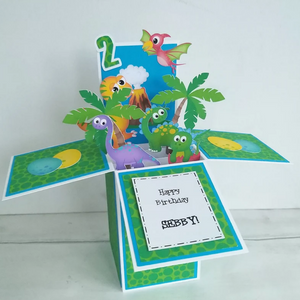 Dinosaur birthday card with pop up dinosaurs.